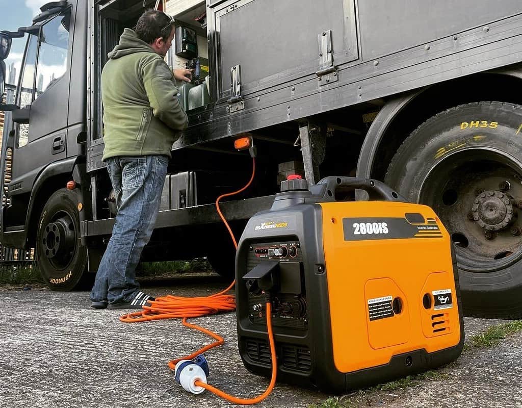 orange generator connected to the trailer