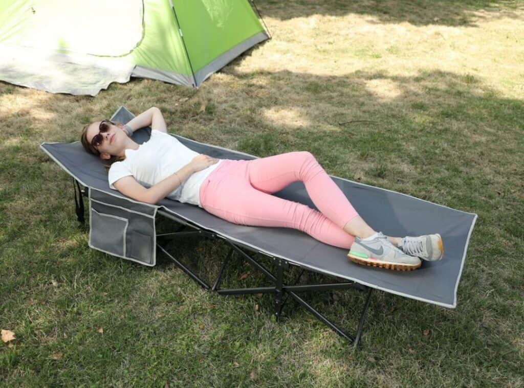 Woman sleeps on cot